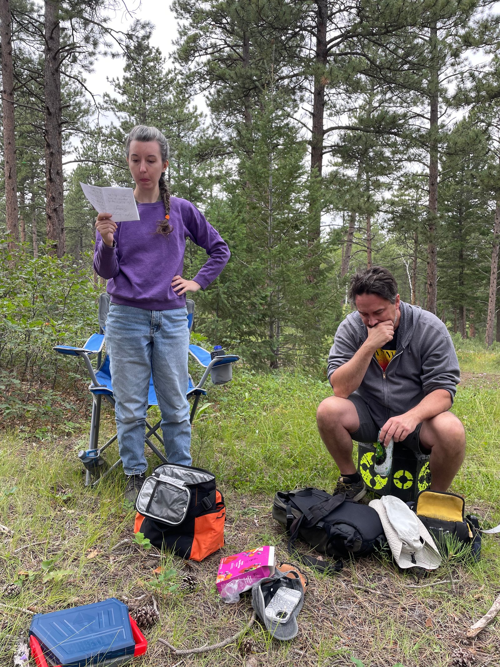 A member reading a poem aloud during a woodsie